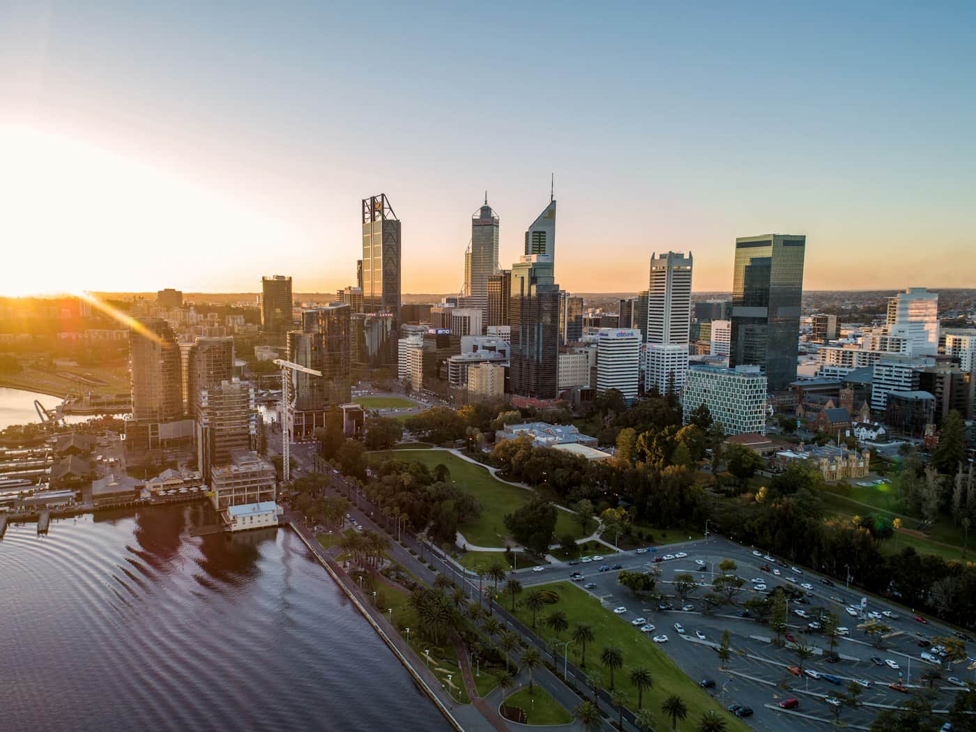 The Perth skyline across the Swan River at sunset